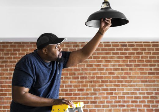 man-changing-lightbulb-2025-02-10-08-48-20-utc
